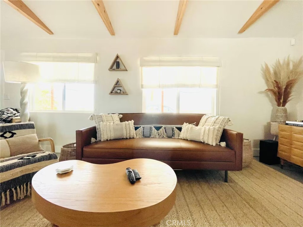 83683 Amboy Road Twentynine Palms, CA 92277 - Photo 9 of 22 a living room with furniture and a large window