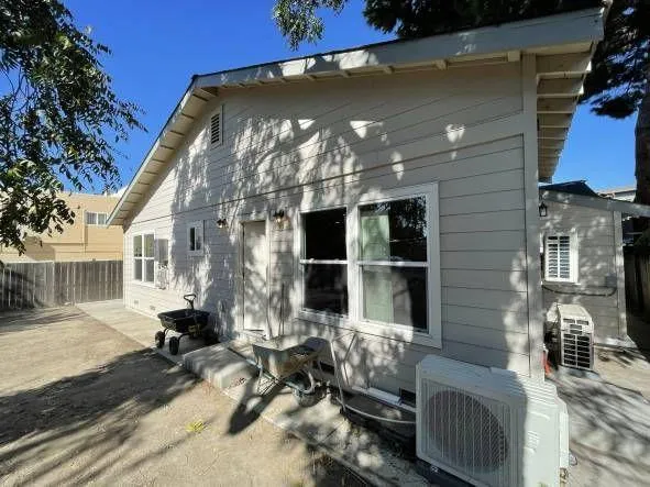 a building outdoor space with patio furniture
