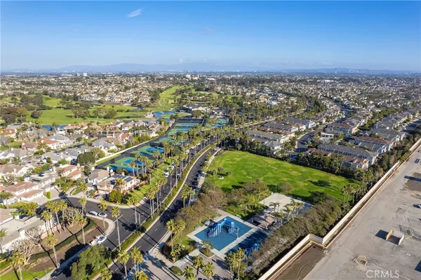 a view of a pathway both side of house