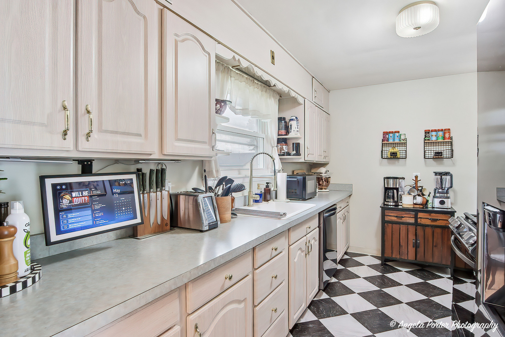 353 Marengo Road Harvard, IL 60033 - Photo 12 of 23 a kitchen with stainless steel appliances granite countertop a sink stove and cabinets