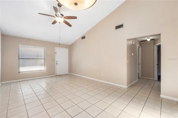 a view of an empty room and window
