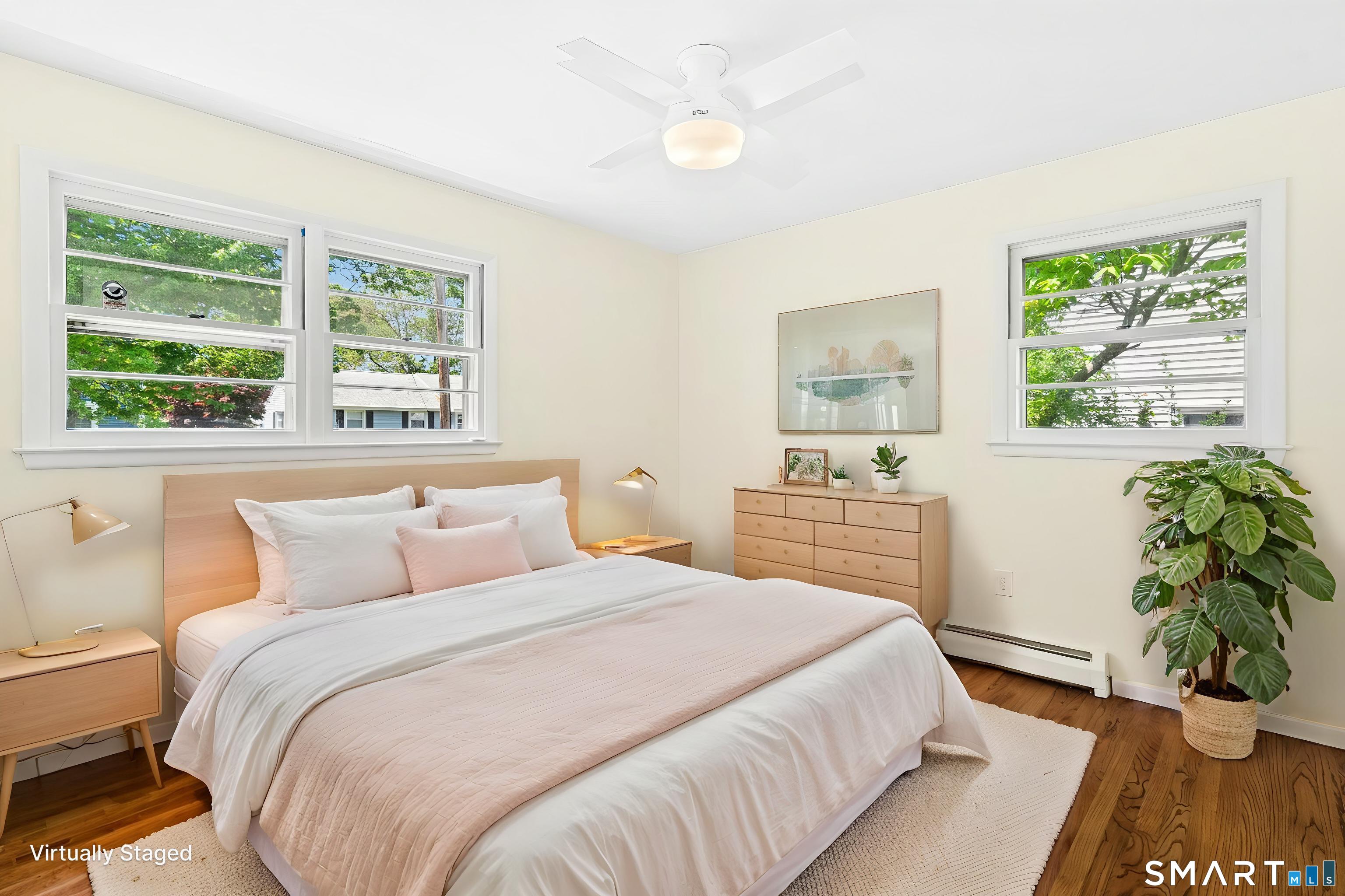 140 Spring Street Stratford, CT 06614 - Photo 17 of 29 a bedroom with a bed and a window