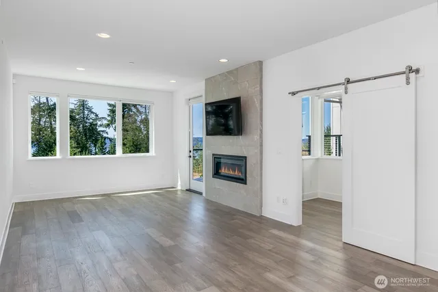 a view of a hallway with white walls