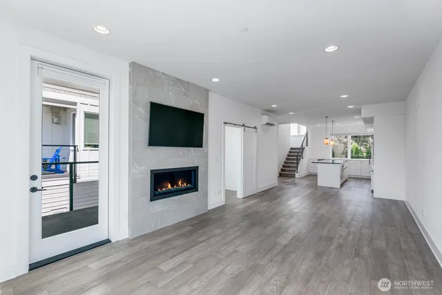 a view of a hallway with entryway door