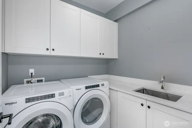 a view of a big room with windows and closet