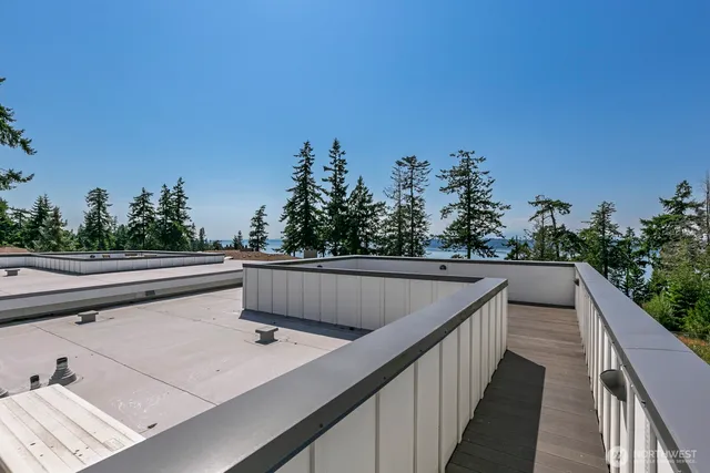 a view of balcony with furniture