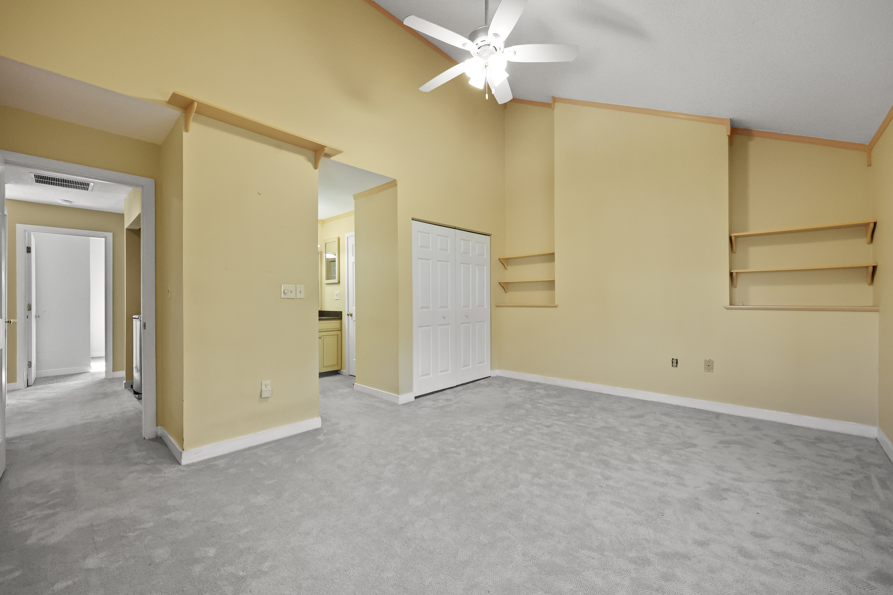 27 Farmington Chase Crescent Farmington, CT 06032 - Photo 24 of 39 an empty room with a ceiling fan and a window
