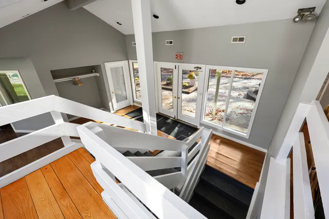 a view of a kitchen with seating area