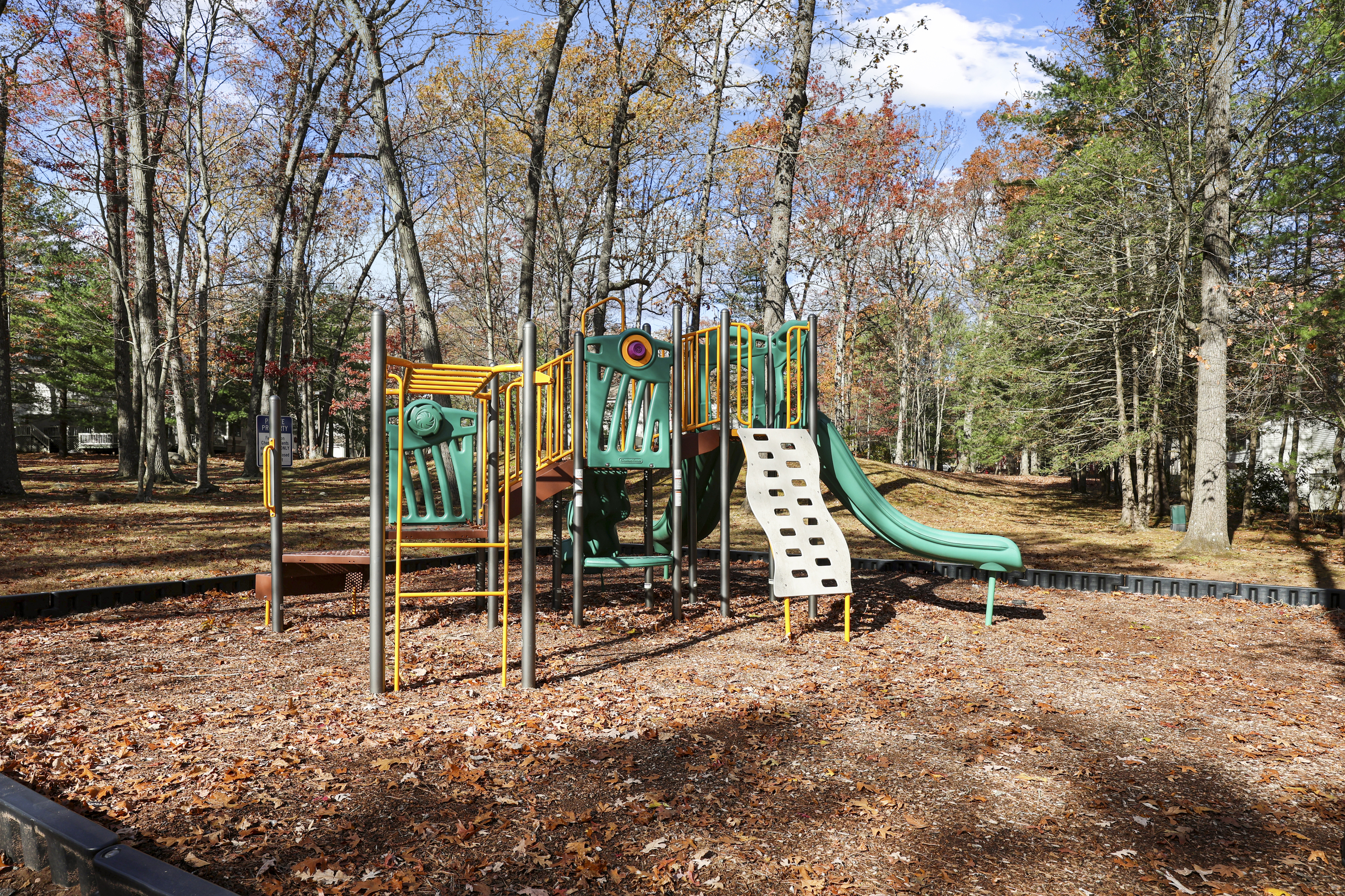 27 Farmington Chase Crescent Farmington, CT 06032 - Photo 37 of 39 a park with bench and trees