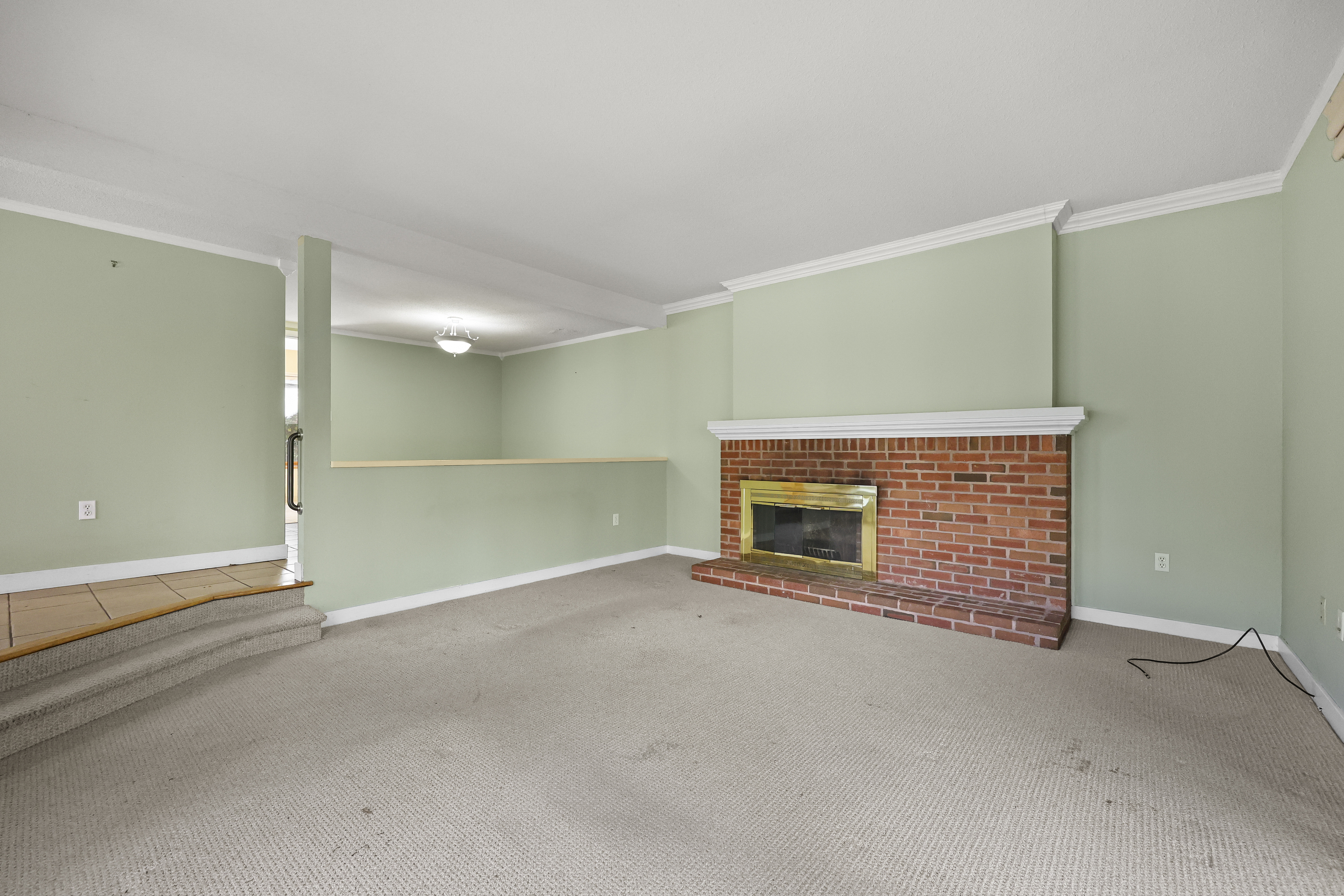 27 Farmington Chase Crescent Farmington, CT 06032 - Photo 6 of 39 an empty room with fireplace
