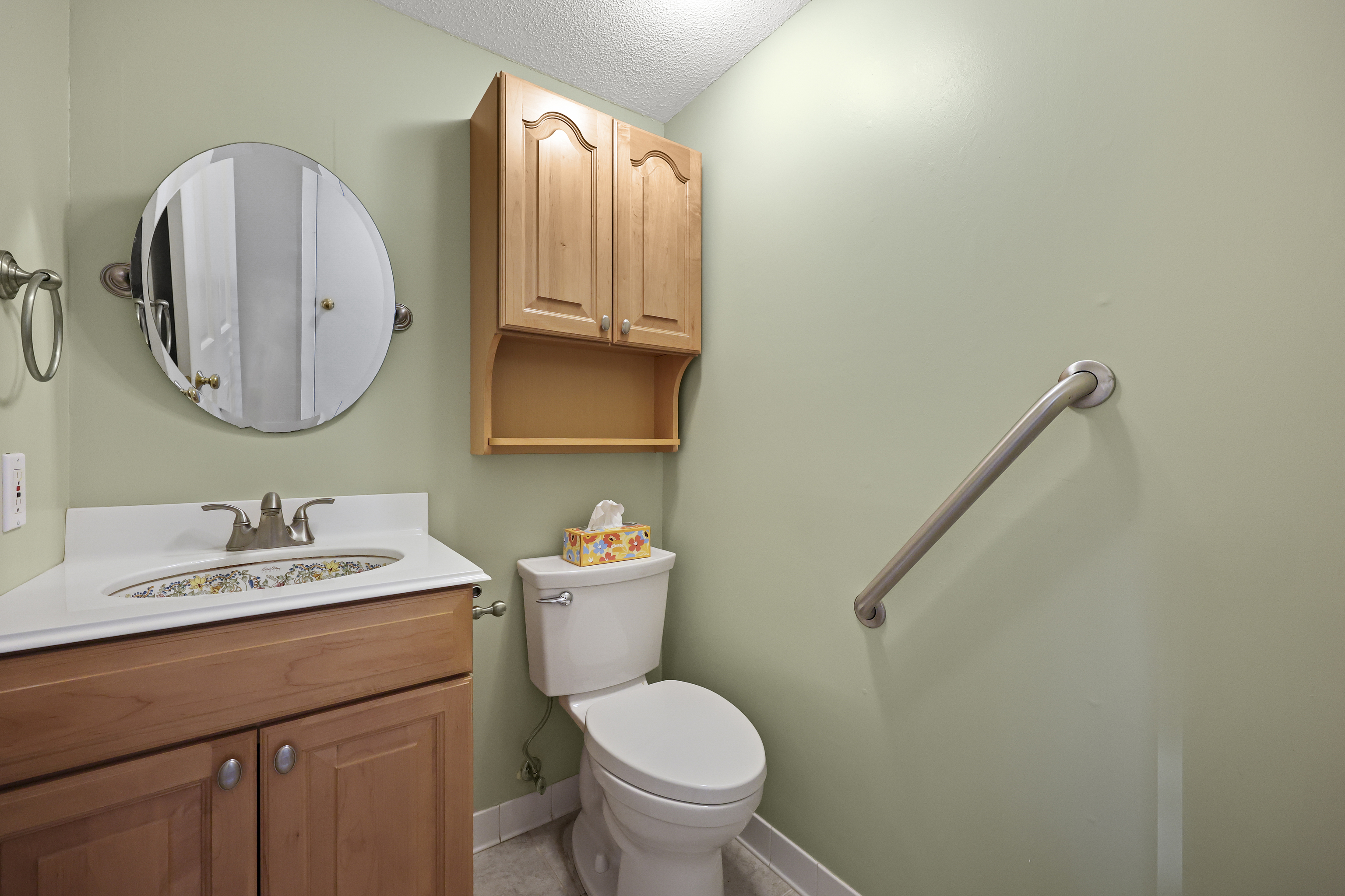27 Farmington Chase Crescent Farmington, CT 06032 - Photo 9 of 39 a bathroom with a toilet sink and mirror