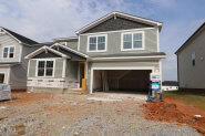 256 Yellow River Way Garner, NC 27529 - Photo 21 of 23 a front view of a house with a yard