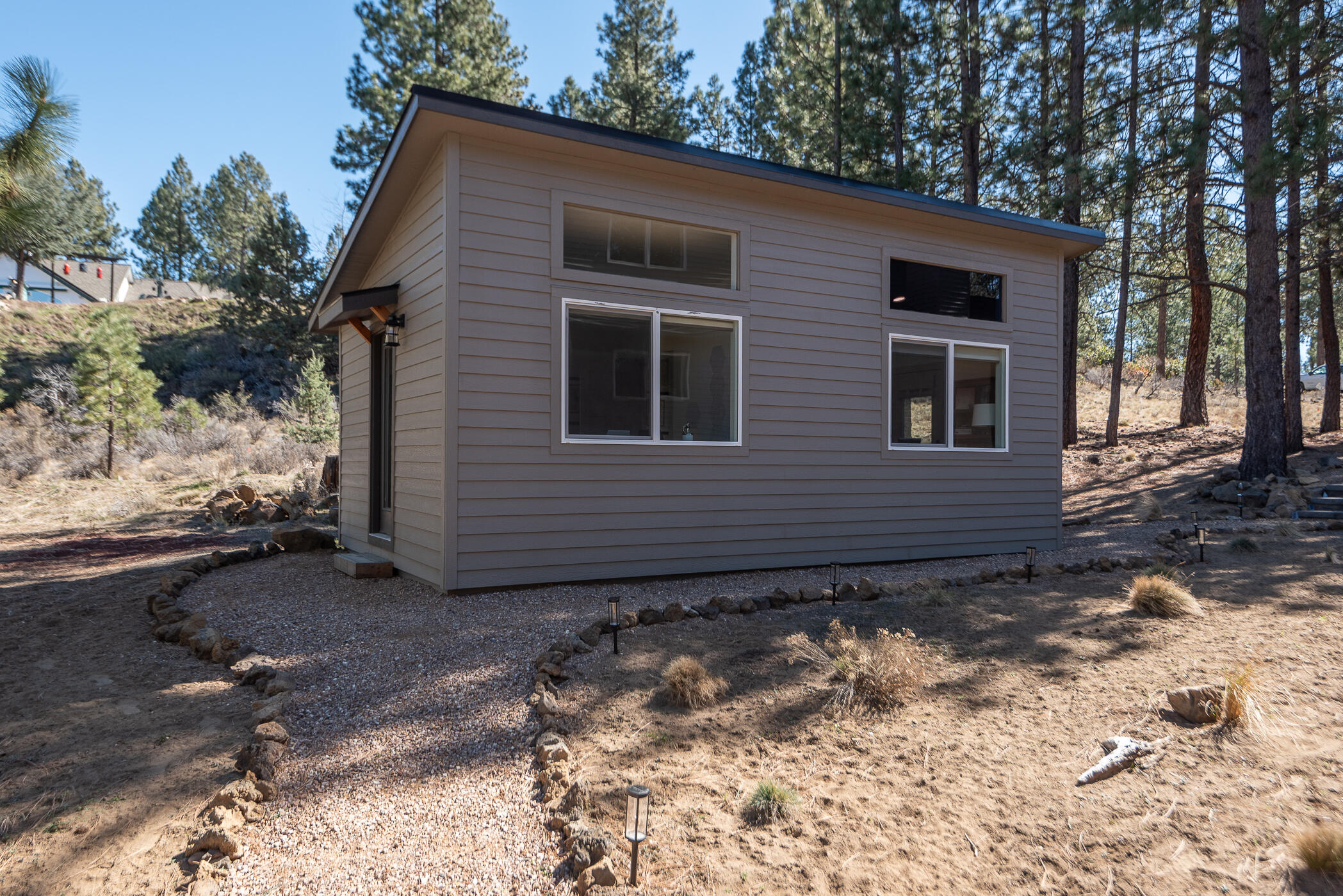 60012 West Ridgeview Drive Bend, OR 97702 - Photo 31 of 55 a view of a house with a yard
