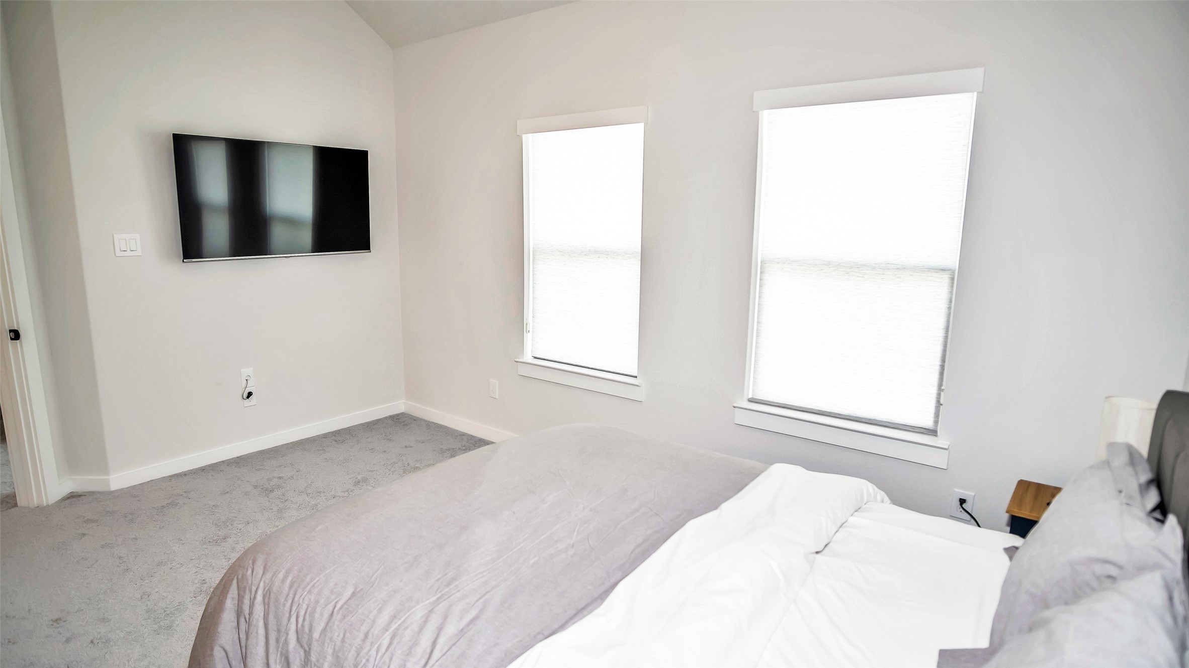 1919 Pueblo Nuevo Path Houston, TX 77077 - Photo 21 of 50 a bedroom with a bed and a window