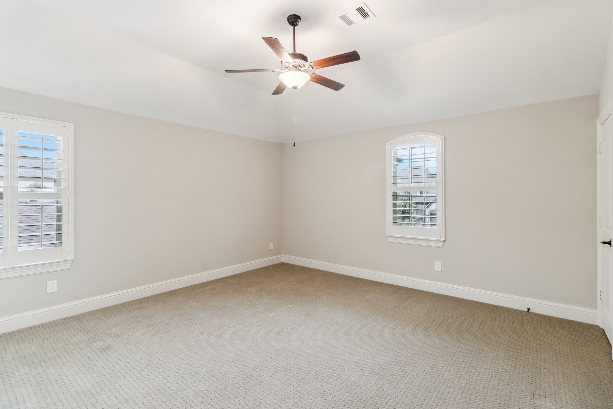 15519 Patten Forest Drive Cypress, TX 77429 - Photo 26 of 46 an empty room with a window and a ceiling fan