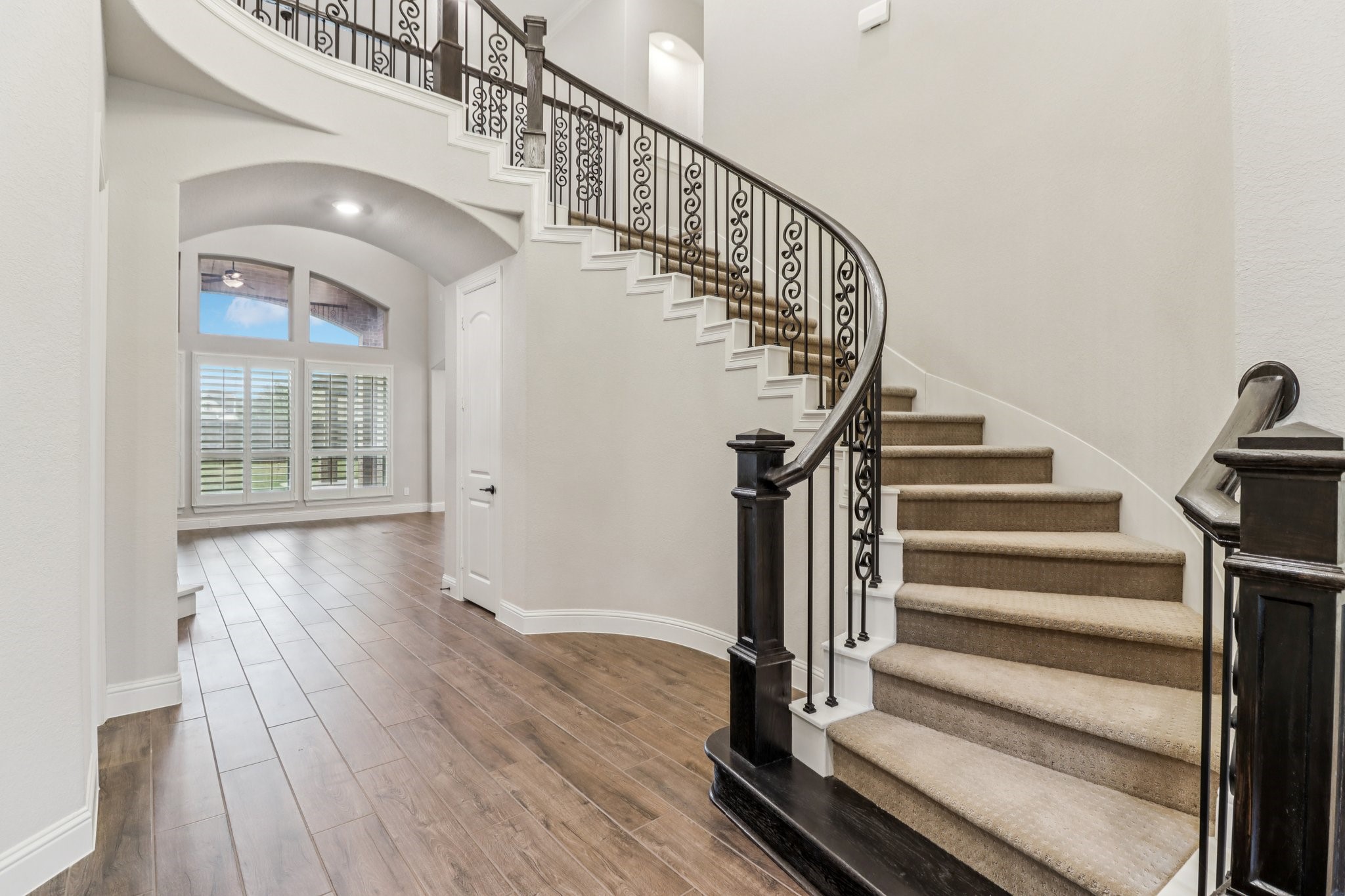 15519 Patten Forest Drive Cypress, TX 77429 - Photo 3 of 46 a view of entryway and hall with wooden floor