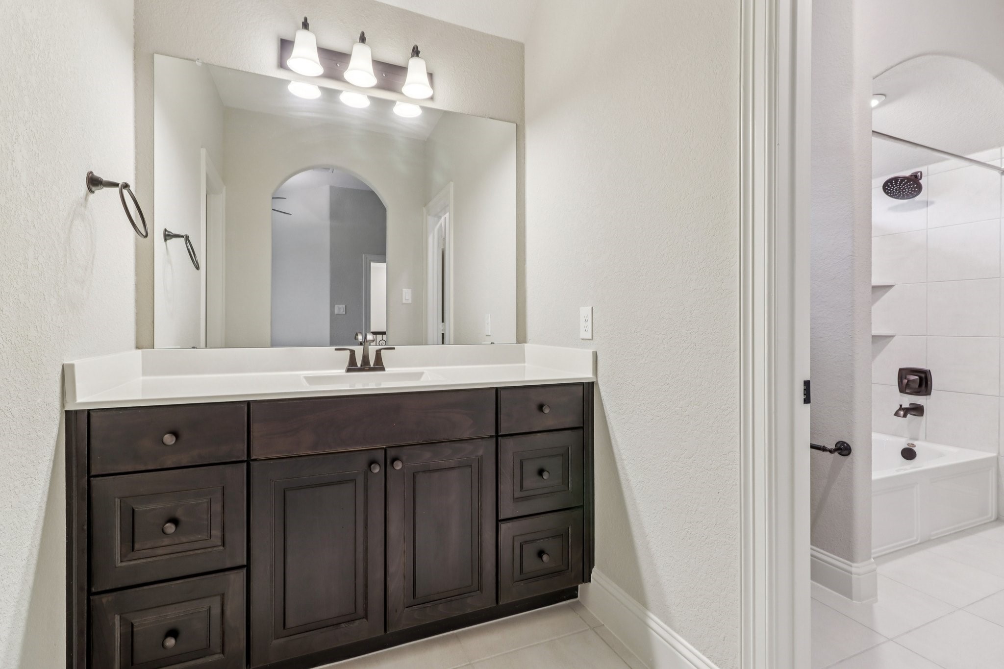 15519 Patten Forest Drive Cypress, TX 77429 - Photo 33 of 46 a bathroom with a double vanity sink mirror and