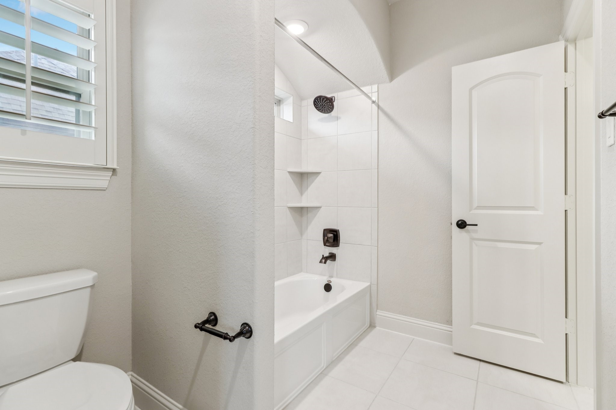 15519 Patten Forest Drive Cypress, TX 77429 - Photo 34 of 46 a bathroom with a toilet and a shower