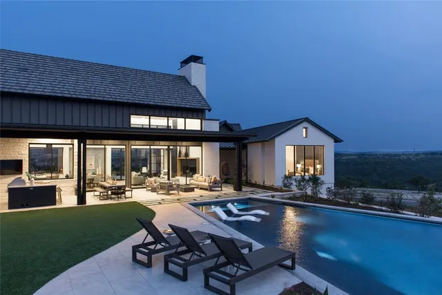 a view of living room and patio furniture and garden