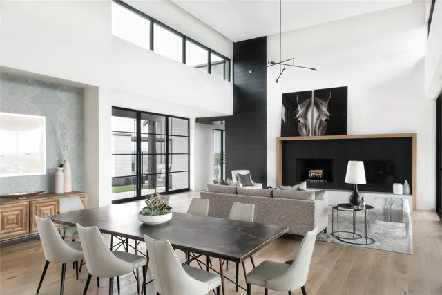 a view of a dining room with furniture and window