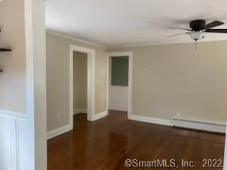 an empty room with a hardwood