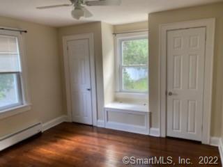 3 Maxson Road Groton, CT 06340 - Photo 9 of 15 a view of a livingroom with a hardwood floor and window