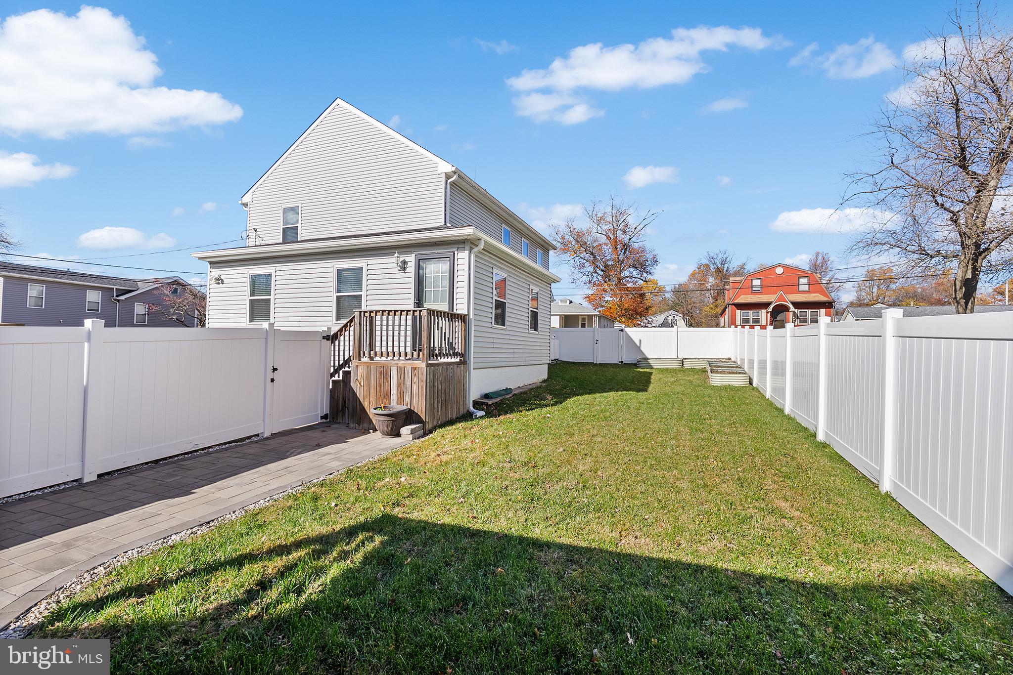 405 Walnut Street Marcus Hook, PA 19061 - Photo 18 of 24 Charming backyard oasis with privacy fencing.