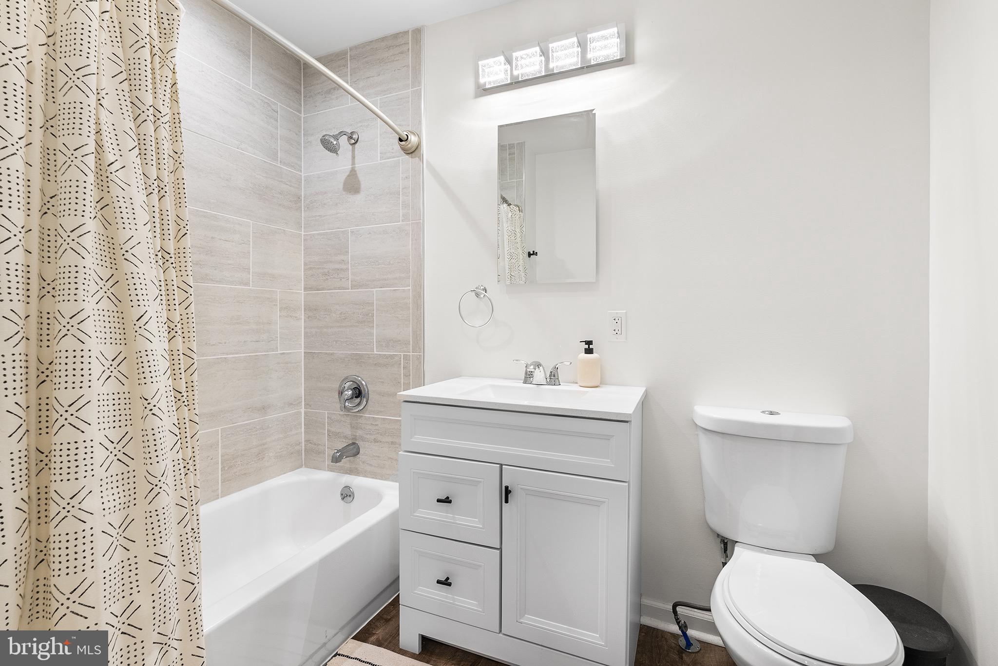 405 Walnut Street Marcus Hook, PA 19061 - Photo 10 of 24 Modern bathroom with elegant finishes.