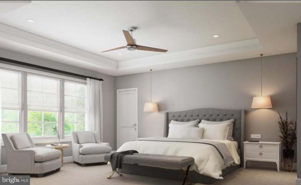 8317 Maplewood Drive Manassas, VA 20111 - Photo 5 of 11 a bedroom with a bed and a couch