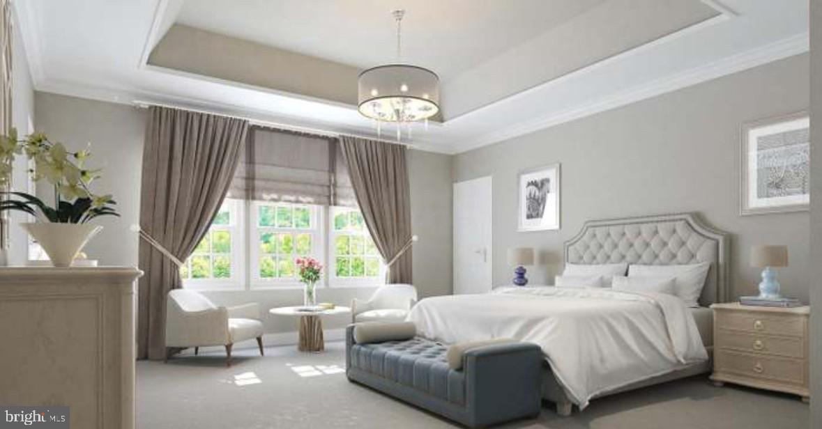 8317 Maplewood Drive Manassas, VA 20111 - Photo 6 of 11 a spacious bedroom with two beds and a chandelier