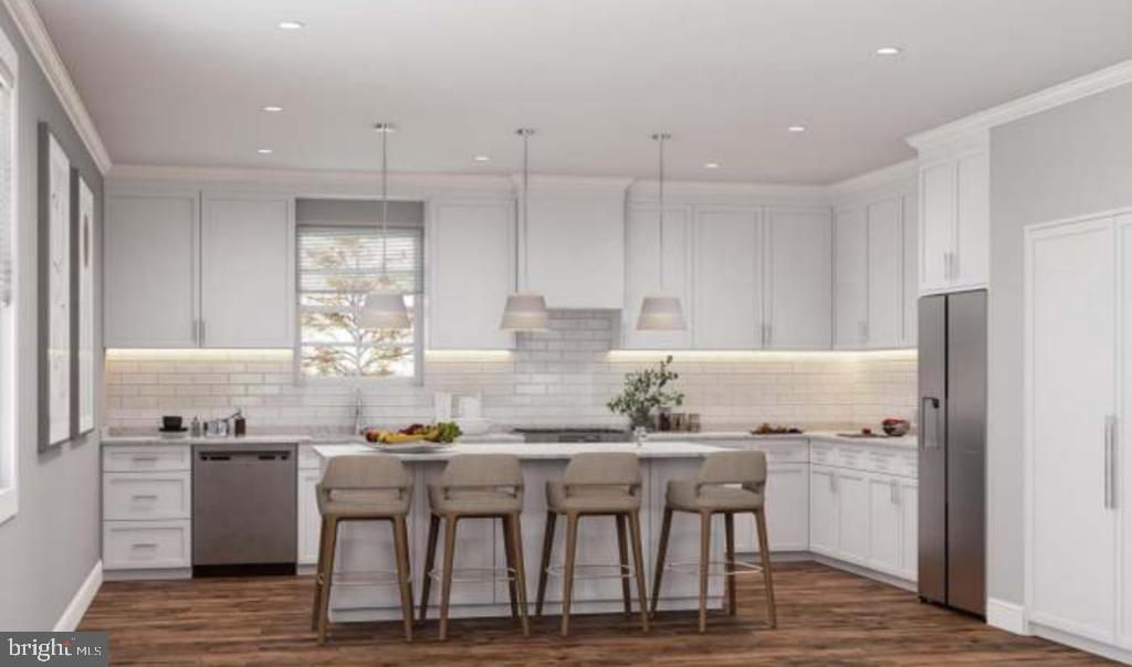 8317 Maplewood Drive Manassas, VA 20111 - Photo 7 of 11 a kitchen with a table and chairs in it