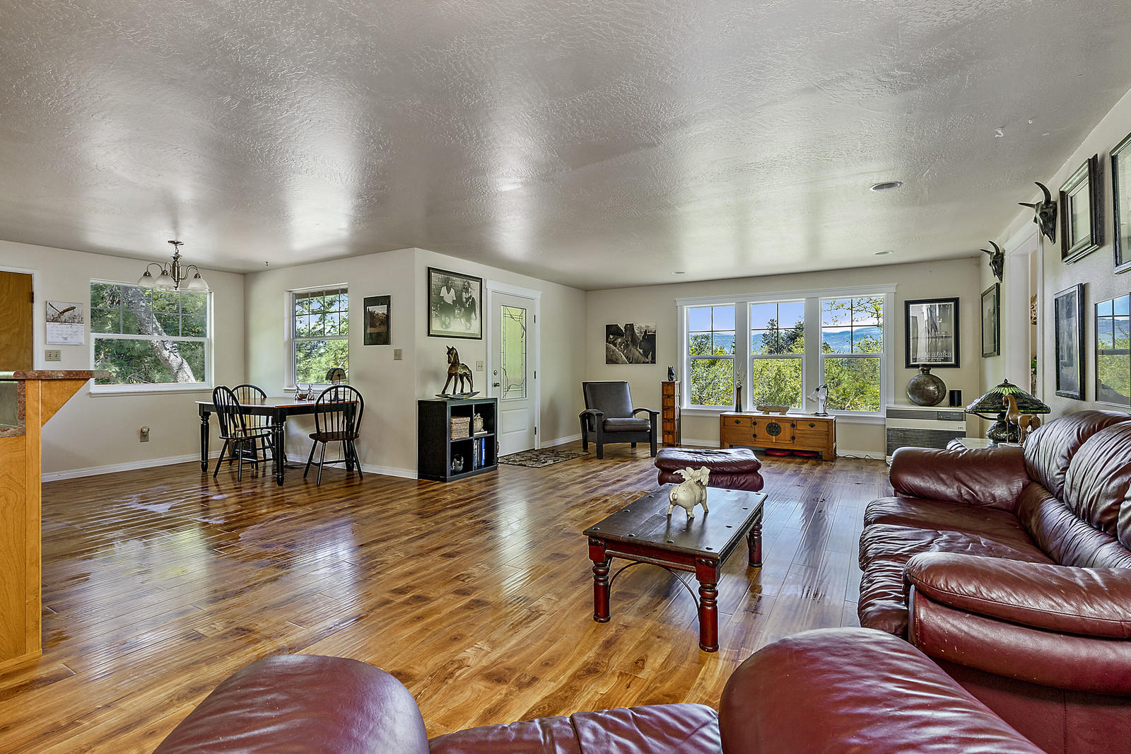 855 Holton Road Talent, OR 97540 - Photo 14 of 78 a living room with fireplace furniture and a wooden floor