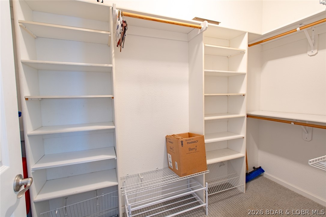 150 Cub Cove Point Camdenton, MO 65020 - Photo 28 of 89 Walk in closet in main level suite