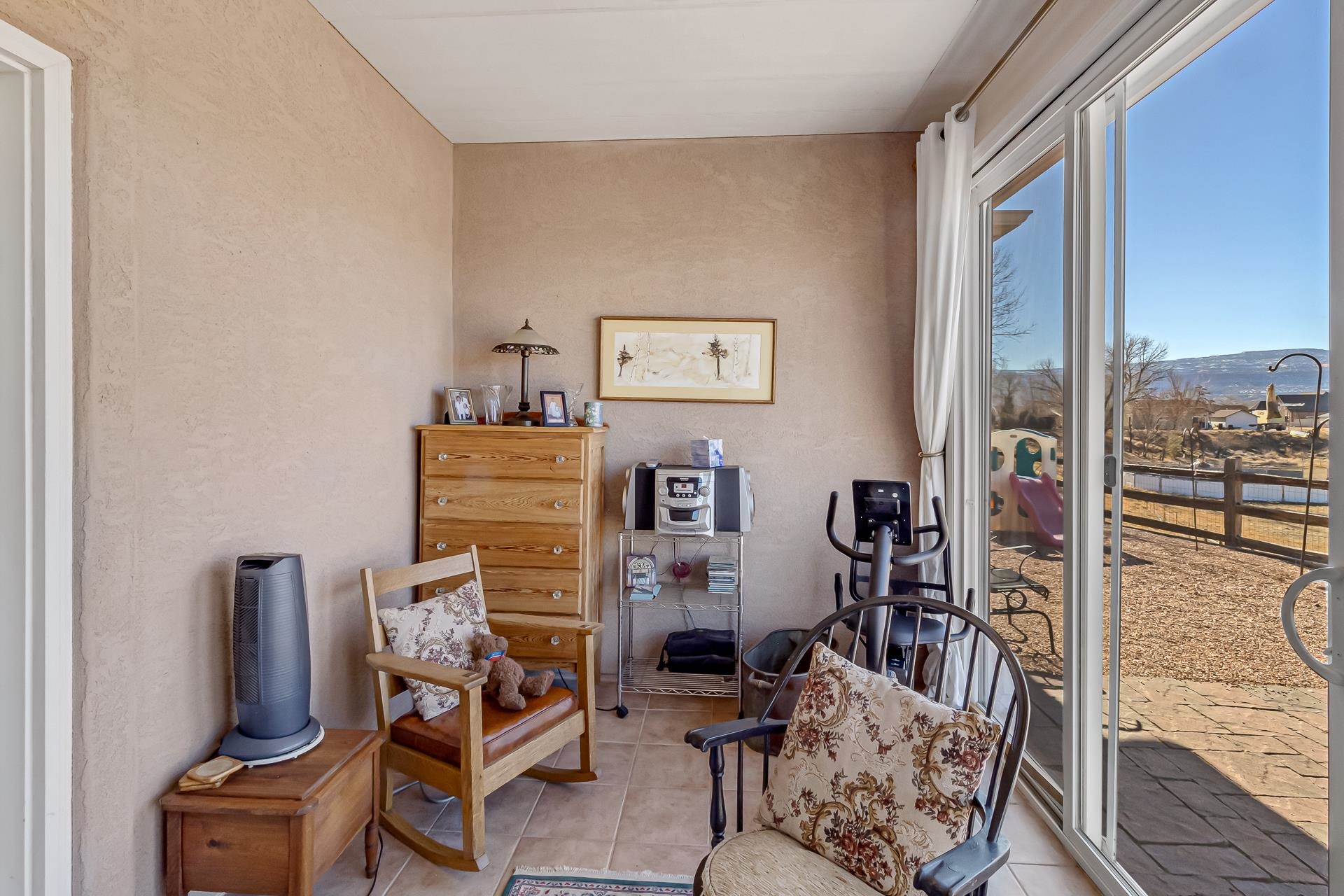 701 Amethyst Drive Fruita, CO 81521 - Photo 11 of 39 a view of a livingroom with workspace and a couch