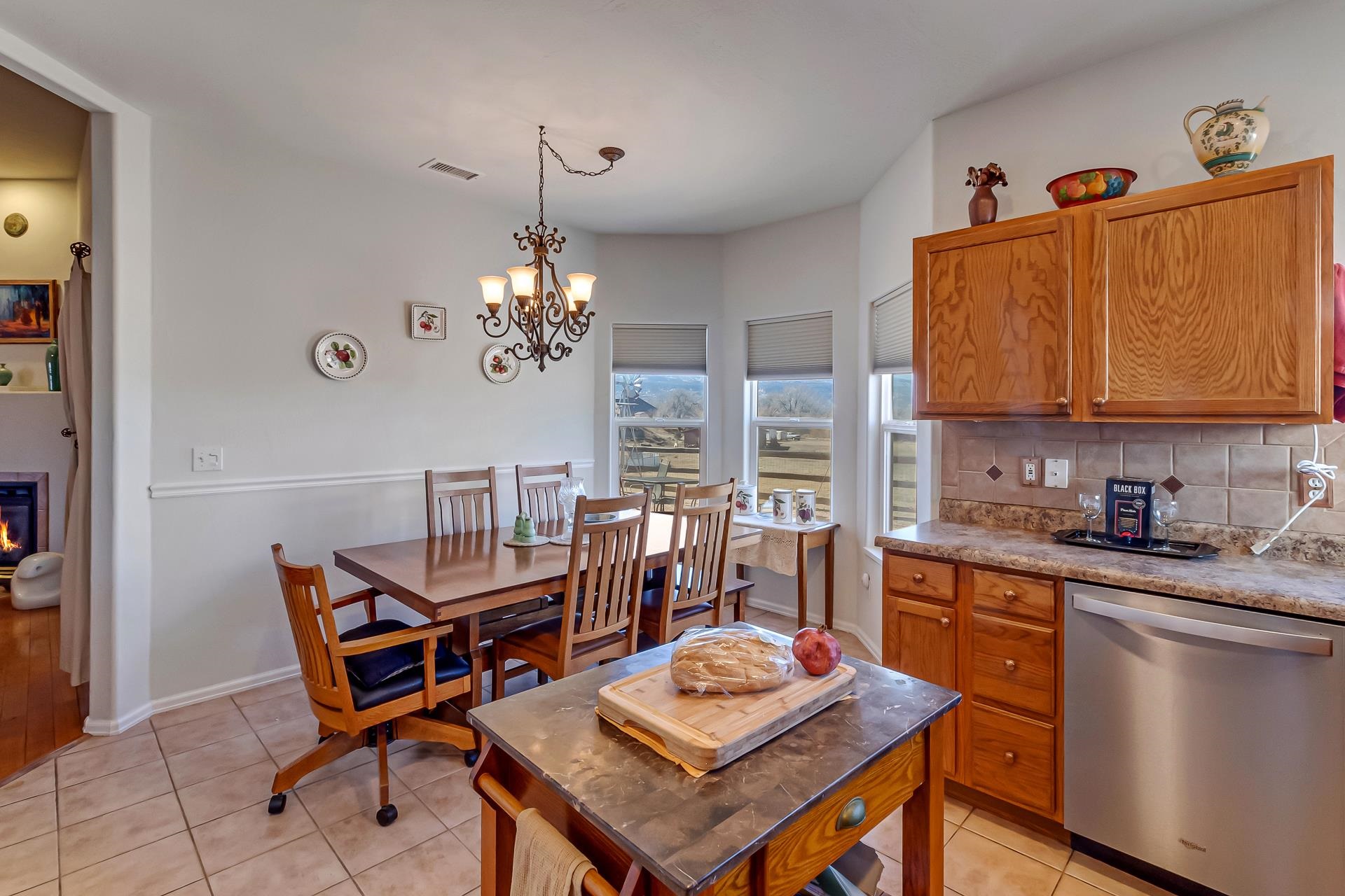 701 Amethyst Drive Fruita, CO 81521 - Photo 14 of 39 a kitchen that has a table and chairs in it