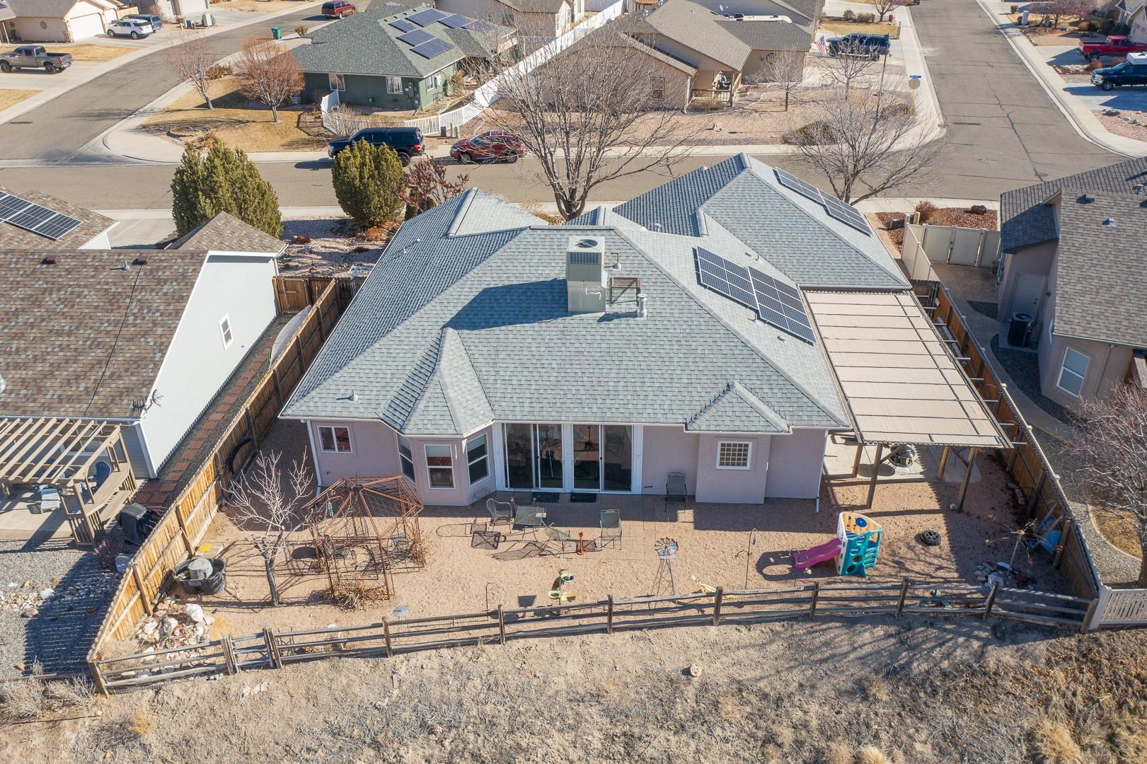 701 Amethyst Drive Fruita, CO 81521 - Photo 39 of 39 a view of a house with a snow in the yard