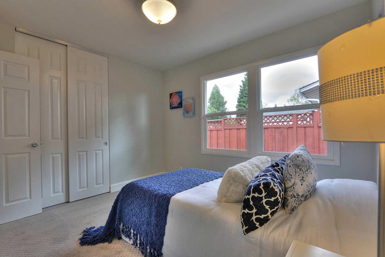1350 Phyllis Avenue Mountain View, CA 94040 - Photo 14 of 27 a bedroom with a bed and a window