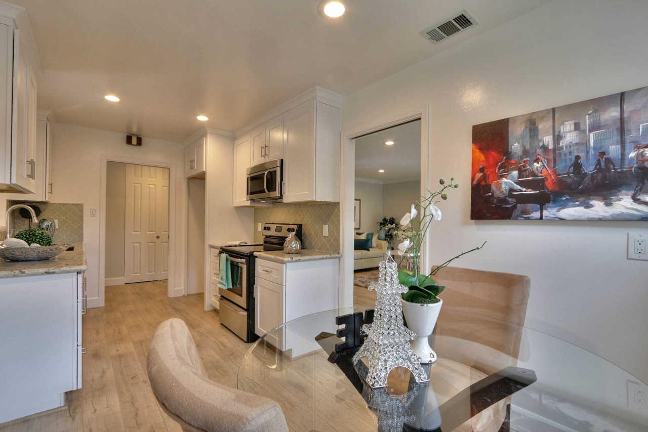 1350 Phyllis Avenue Mountain View, CA 94040 - Photo 7 of 27 a living room with furniture kitchen area and a wooden floor