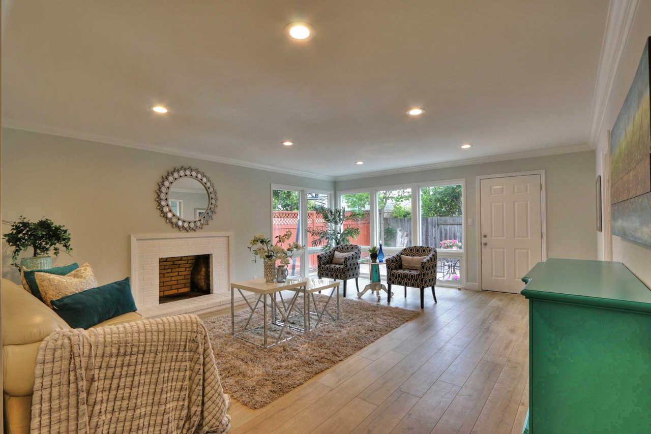1350 Phyllis Avenue Mountain View, CA 94040 - Photo 8 of 27 a living room with furniture fireplace and window