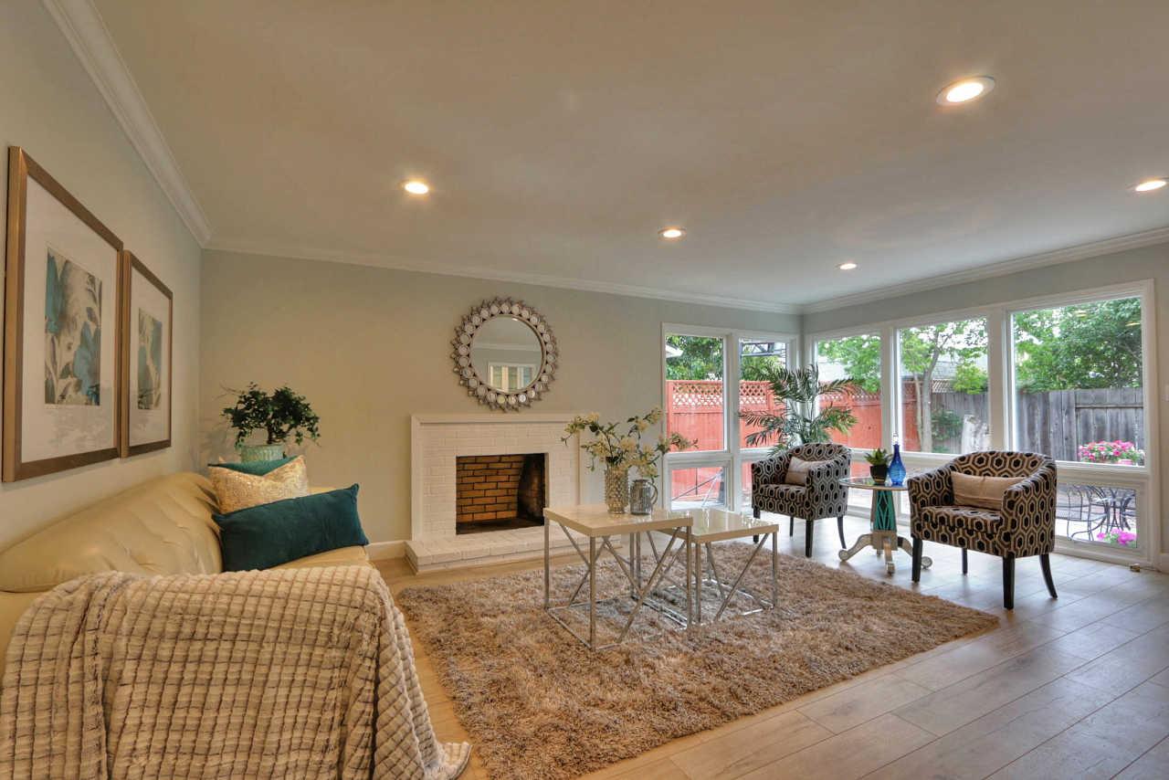 1350 Phyllis Avenue Mountain View, CA 94040 - Photo 9 of 27 a living room with fireplace furniture and a large window