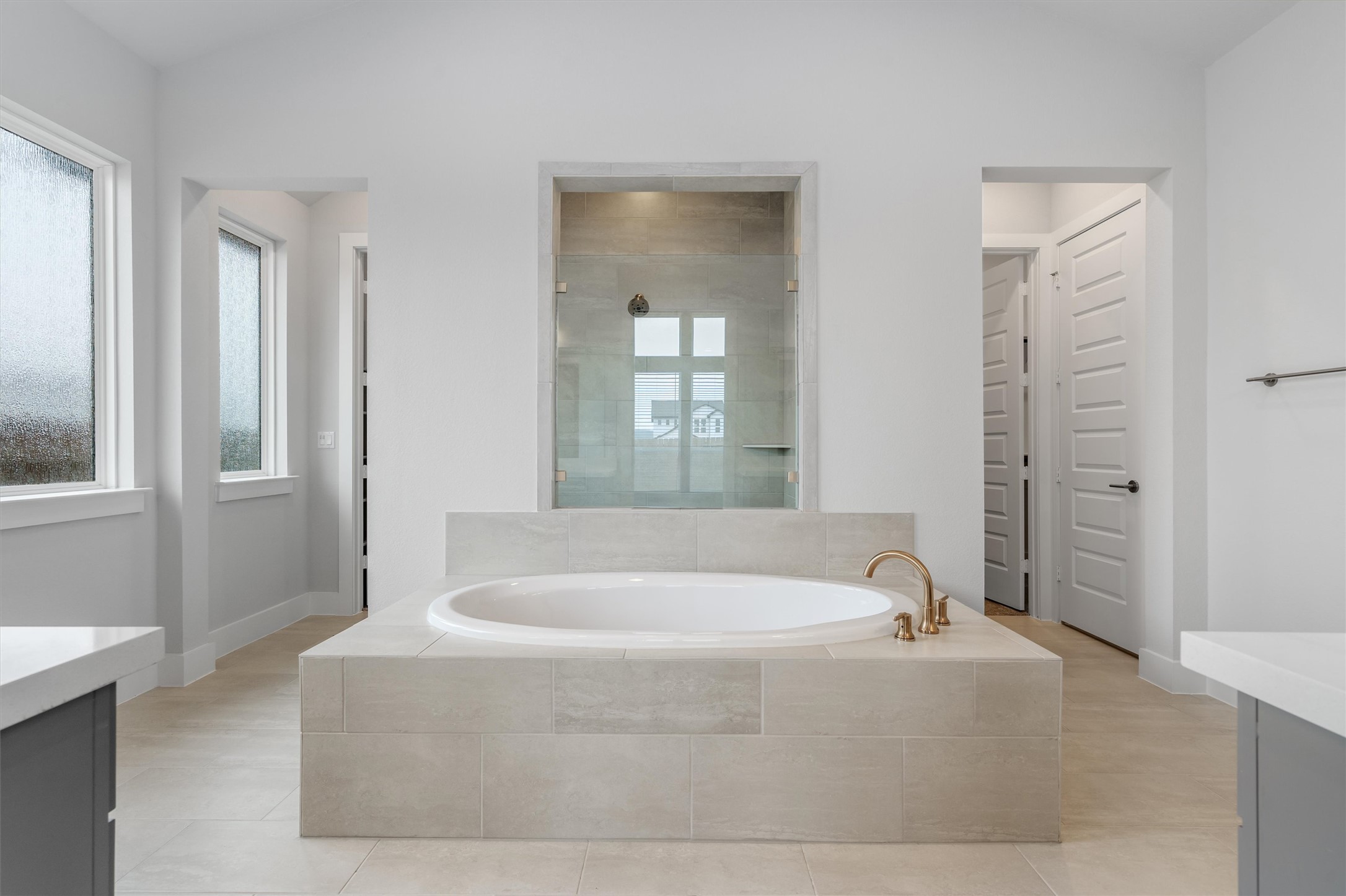 8516 Picnic House Path Austin, TX 78744 - Photo 18 of 39 a spacious bathroom with bathtub and shower