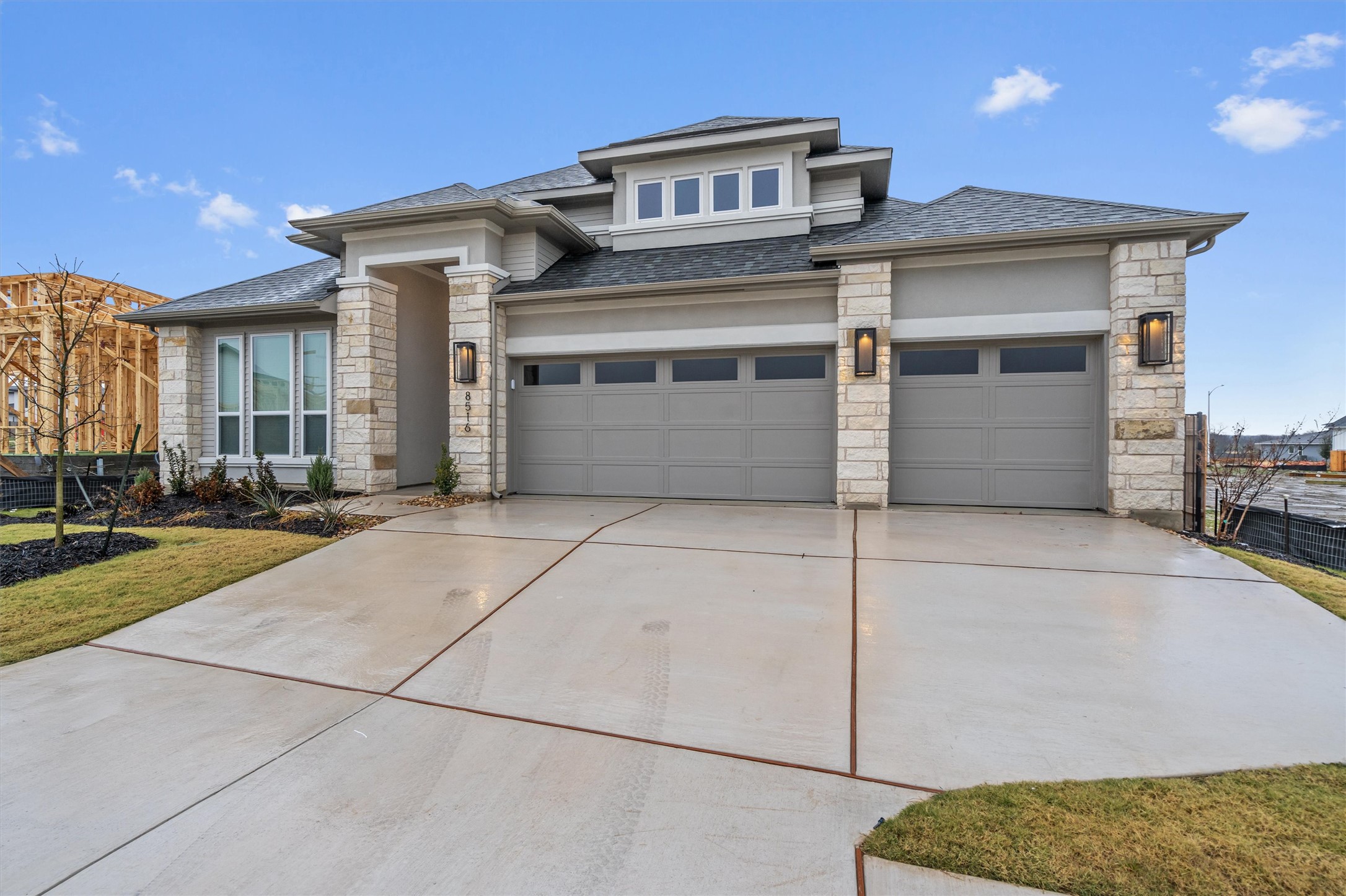 8516 Picnic House Path Austin, TX 78744 - Photo 2 of 39 a view of a house with a garage