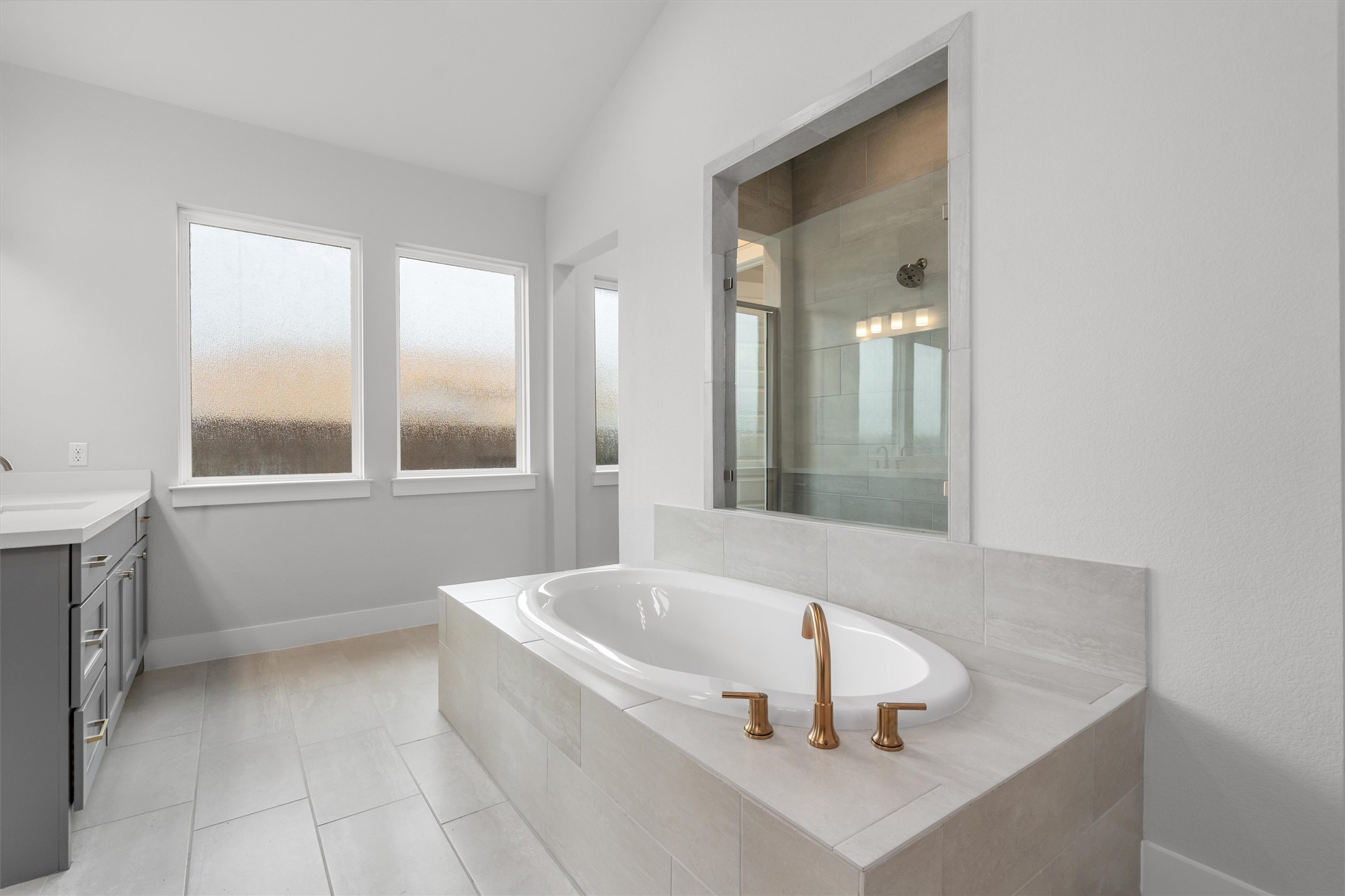 8516 Picnic House Path Austin, TX 78744 - Photo 20 of 39 a white bath tub sitting in a bathroom