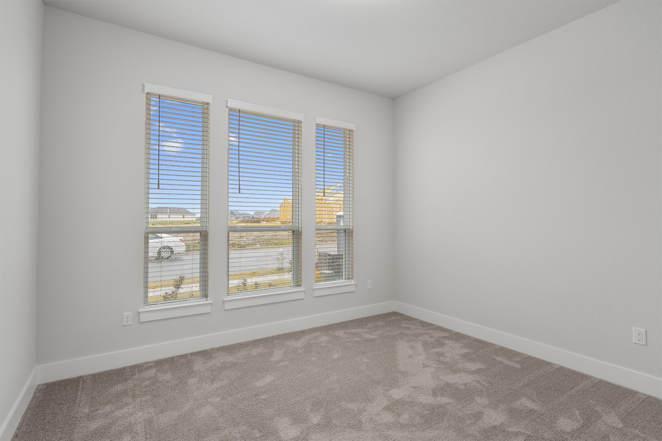 8516 Picnic House Path Austin, TX 78744 - Photo 22 of 39 an empty room with windows