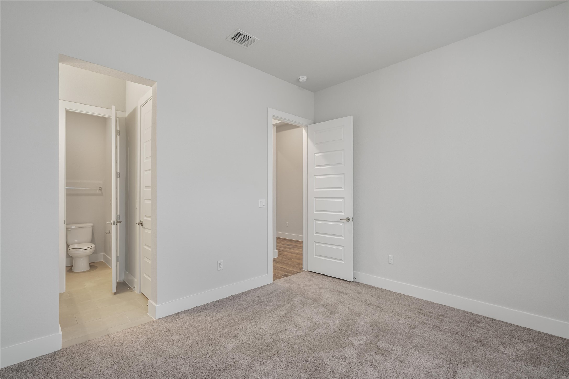 8516 Picnic House Path Austin, TX 78744 - Photo 23 of 39 an empty room with closet and bathroom