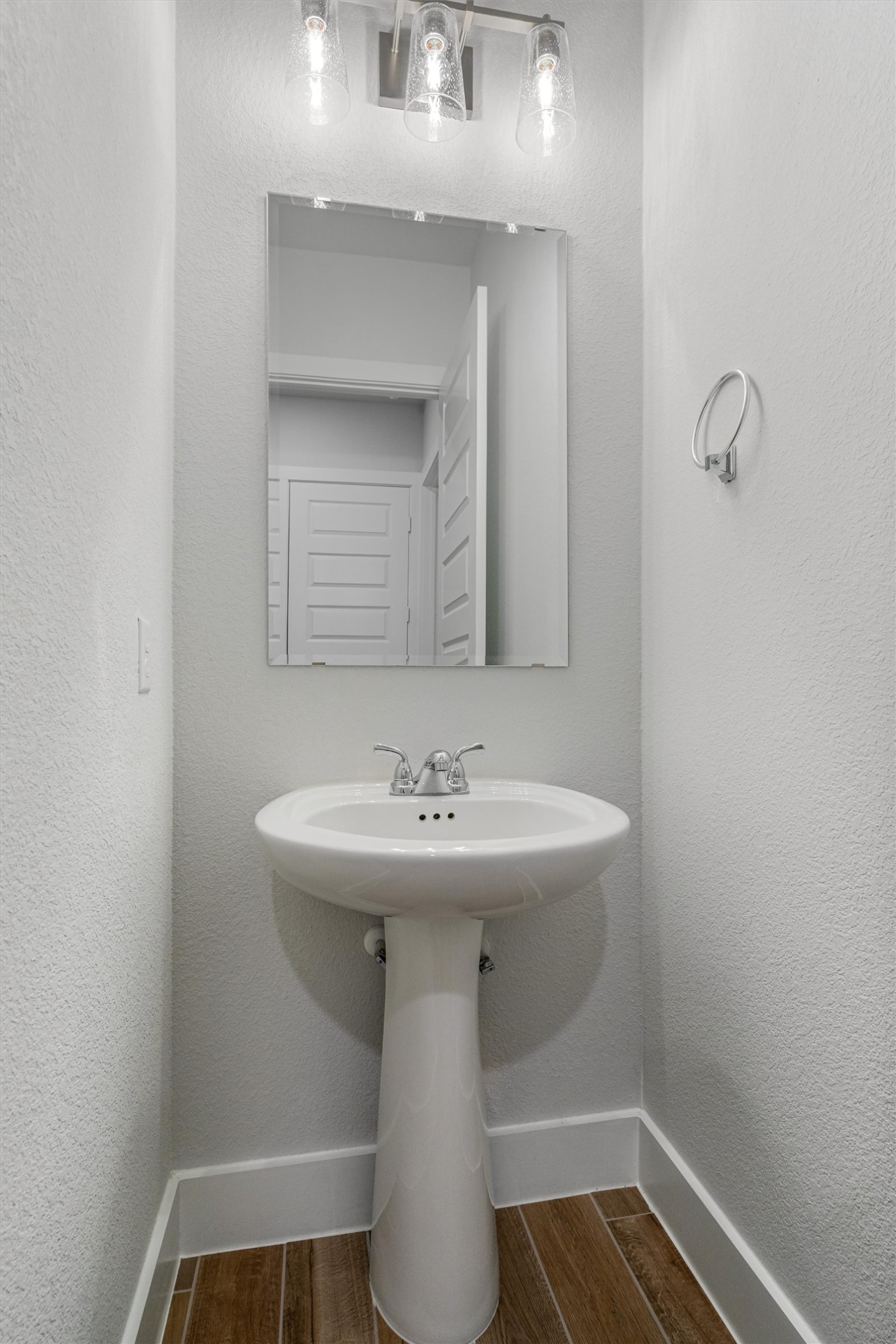 8516 Picnic House Path Austin, TX 78744 - Photo 29 of 39 a bathroom with a sink and a mirror