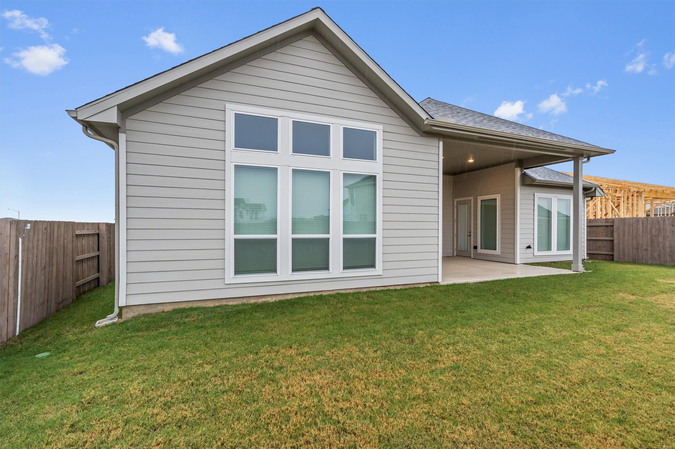 8516 Picnic House Path Austin, TX 78744 - Photo 36 of 39 a front view of a house with a garden