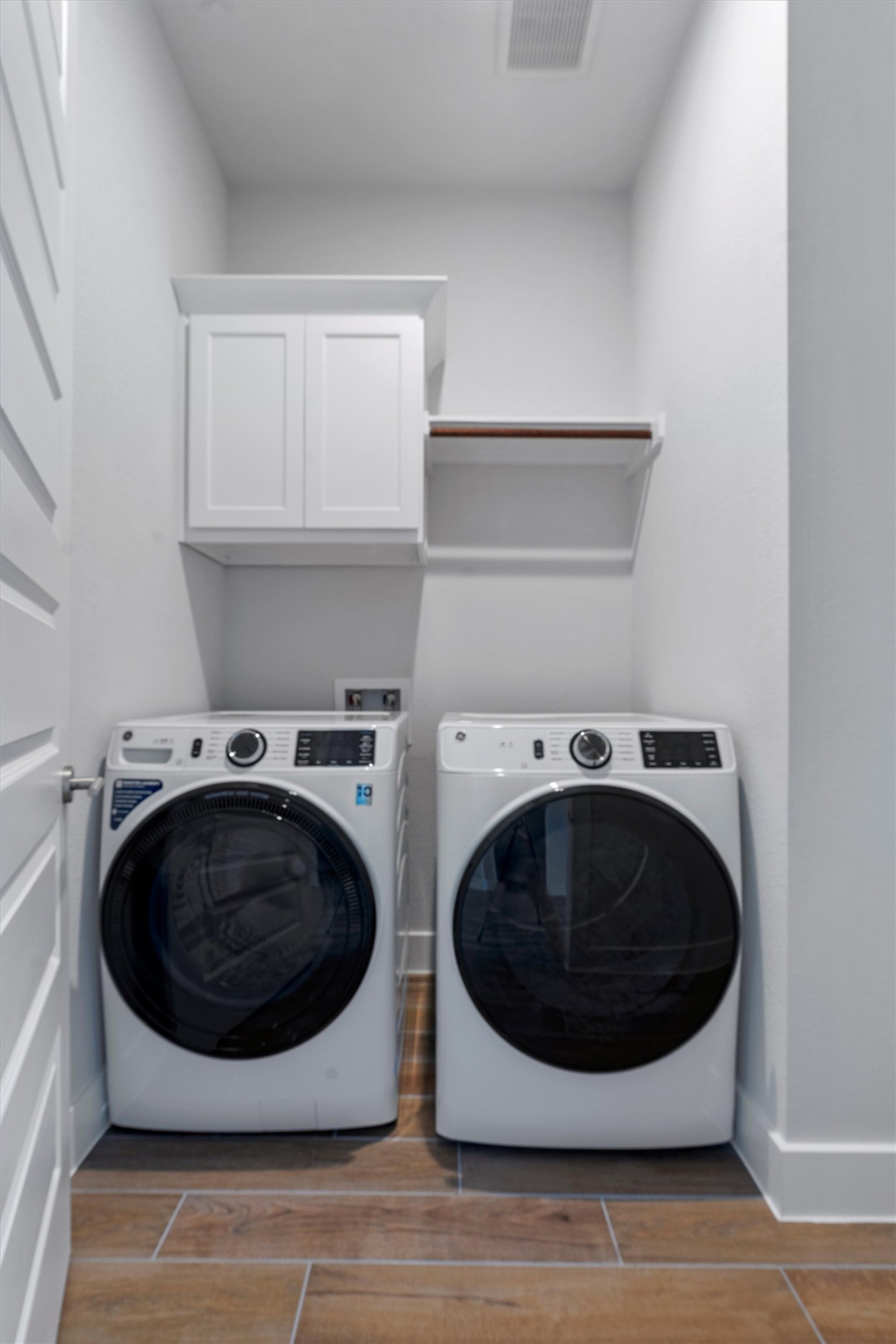 8516 Picnic House Path Austin, TX 78744 - Photo 7 of 39 a utility room with dryer and washer