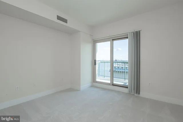 a living room with furniture and window