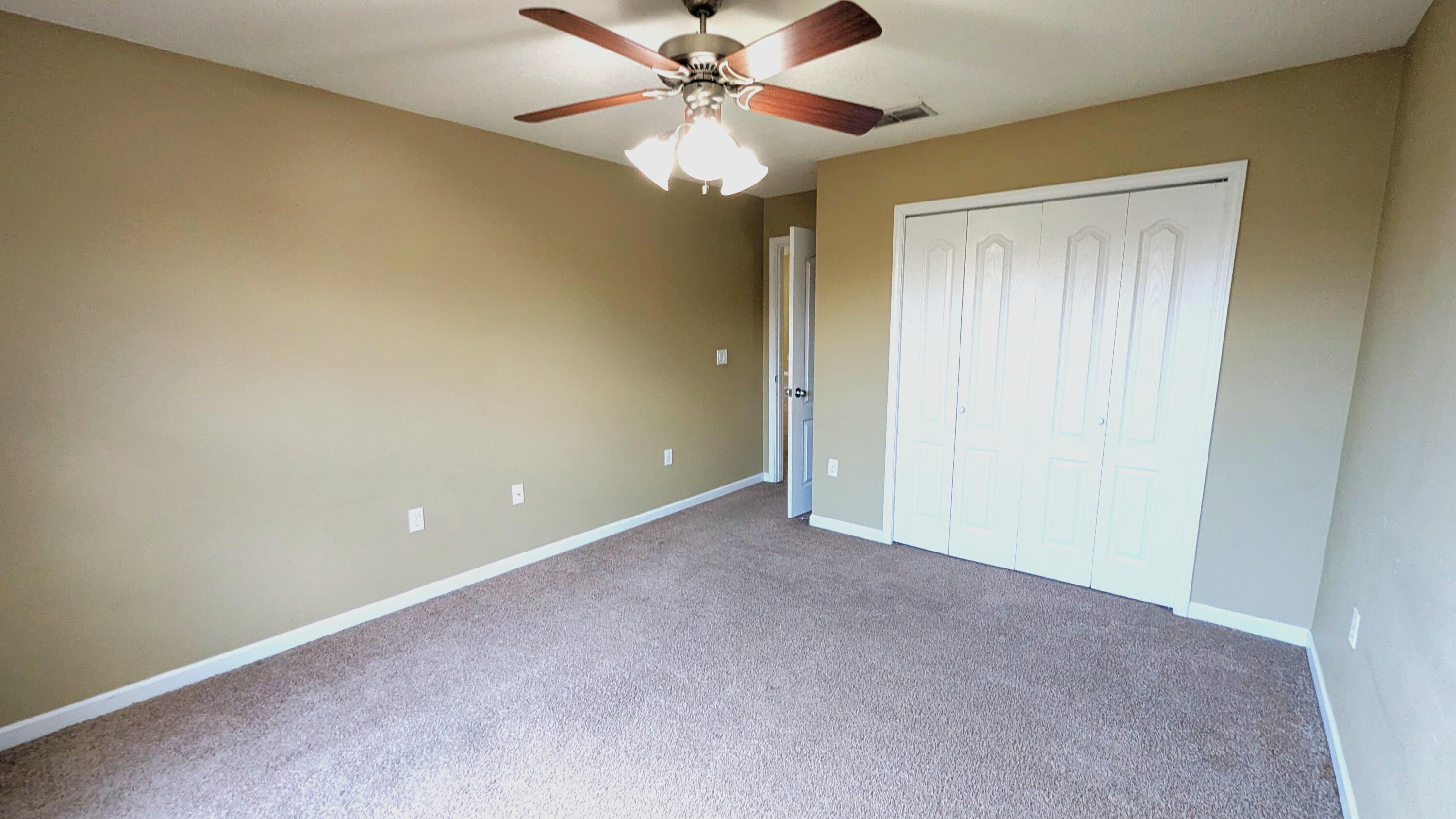 7976 Promise Creek Road Navarre, FL 32566 - Photo 15 of 29 a view of an empty room